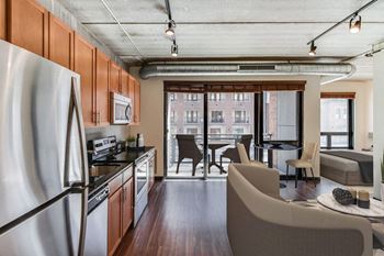 Custom finishing packages that include quartz countertops, maple cabinetry and stainless-steel whirlpool appliances.